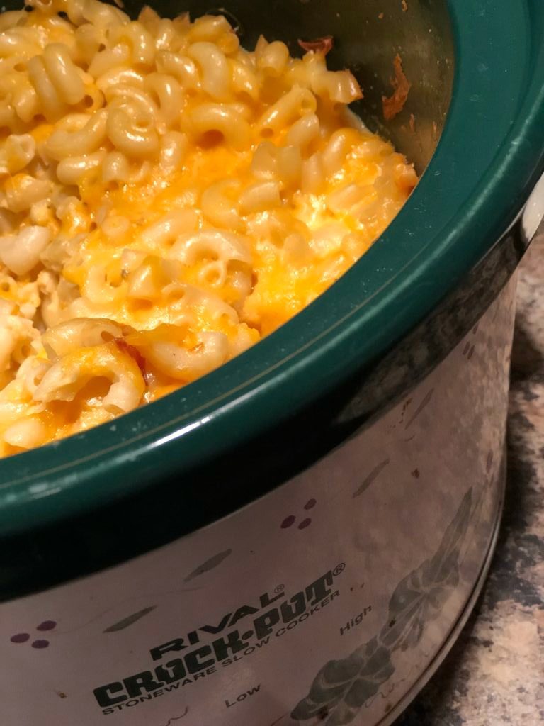 This Crock Pot Macaroni and Cheese is easy and so much better than one from a box. As the ultimate comfort food, it is so creamy and dreamy. #WomenLivingWell #CrockPotRecipes #MacaroniandCheese #EasyComfortfoods