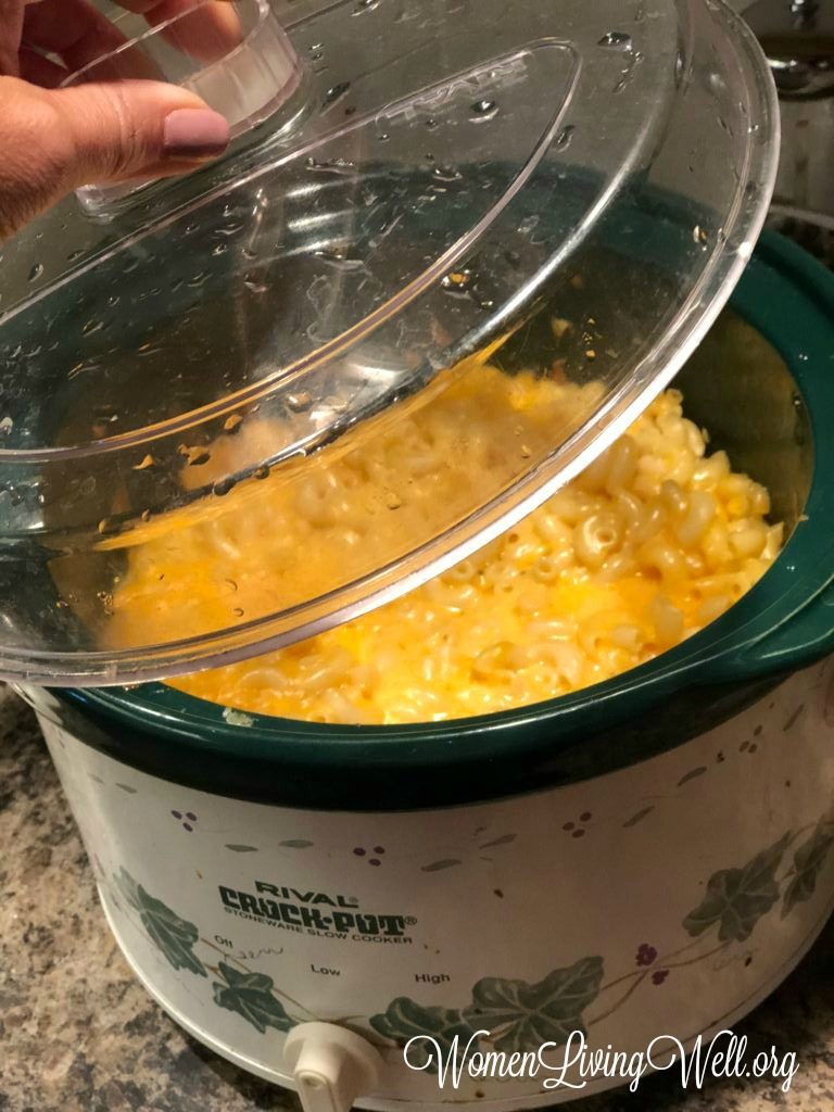 This Crock Pot Macaroni and Cheese is easy and so much better than one from a box. As the ultimate comfort food, it is so creamy and dreamy. #WomenLivingWell #CrockPotRecipes #MacaroniandCheese #EasyComfortfoods