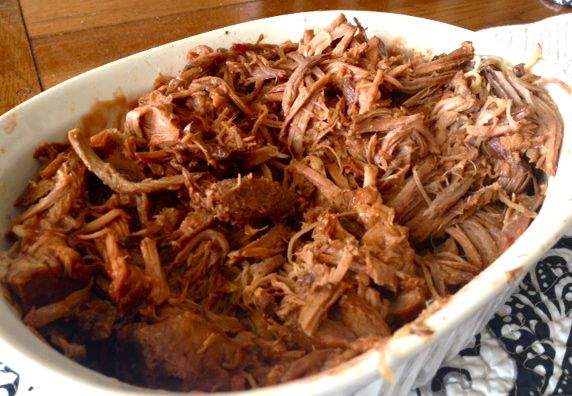 This easy, slow cooker pulled pork recipe is the best and it's great served alone or on delicious sandwiches for a quick meal. #easyrecipe #slowcooker #pork #dinner